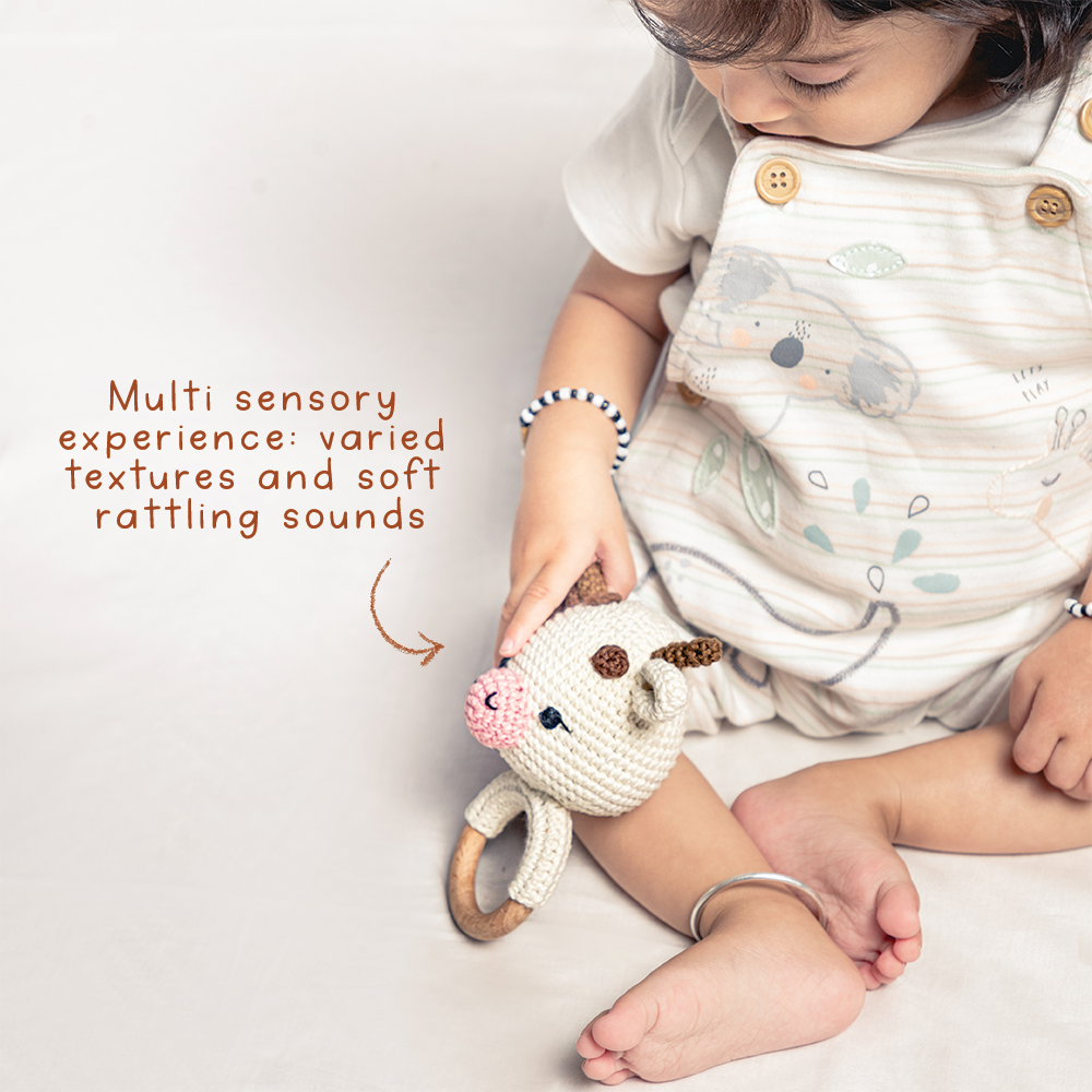 AMBA RATTLE WITH CREAM SWADDLE - GUBBACHHI