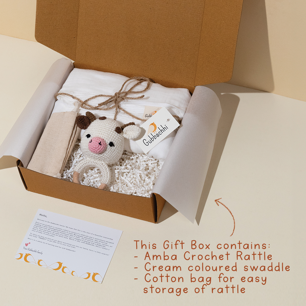 AMBA RATTLE WITH CREAM SWADDLE - GUBBACHHI